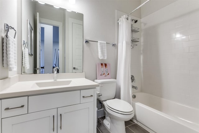 full bathroom with vanity, shower / bath combo, tile patterned floors, and toilet