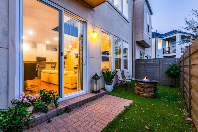 exterior space featuring a fire pit