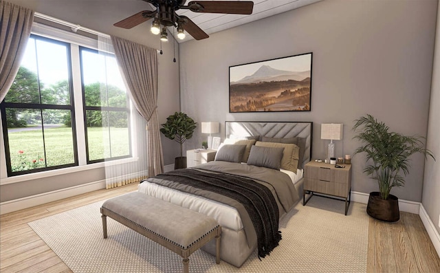 bedroom with ceiling fan and light wood-type flooring