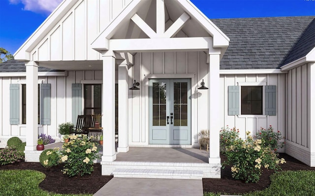 view of exterior entry featuring french doors