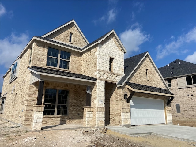 view of front of home with a garage