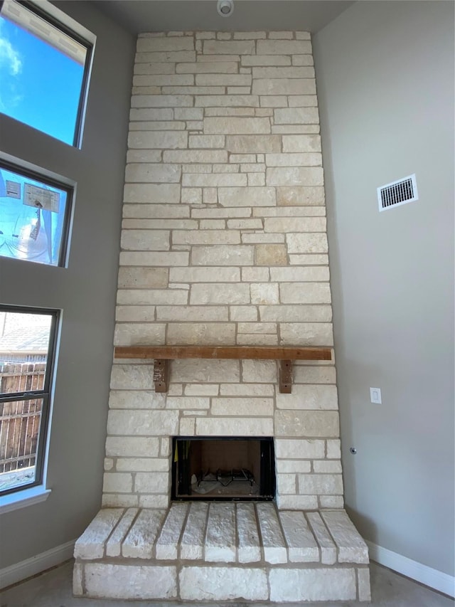 details featuring a stone fireplace