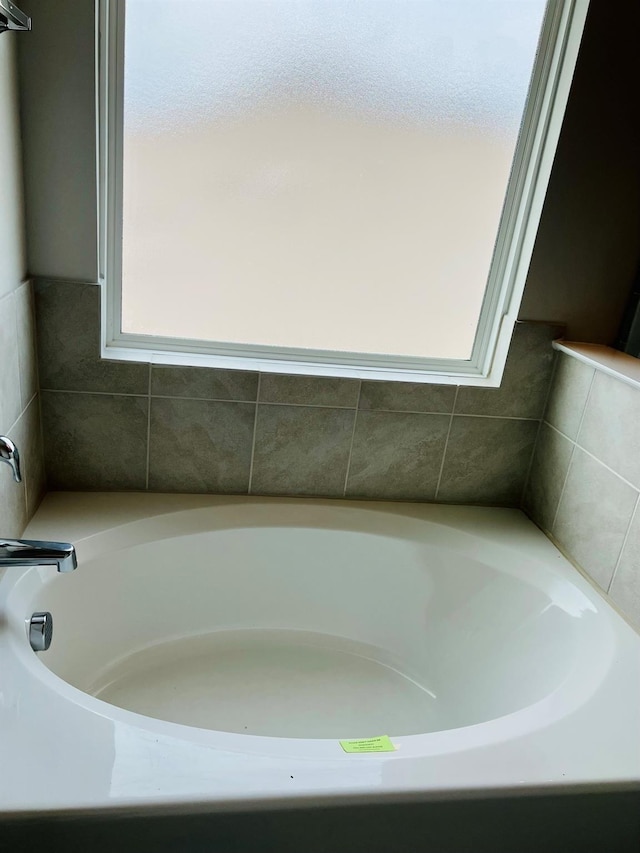 bathroom featuring a bath