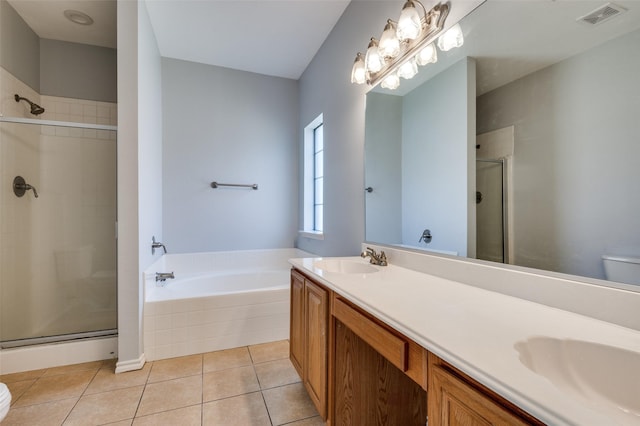 full bathroom with plus walk in shower, tile patterned flooring, and toilet