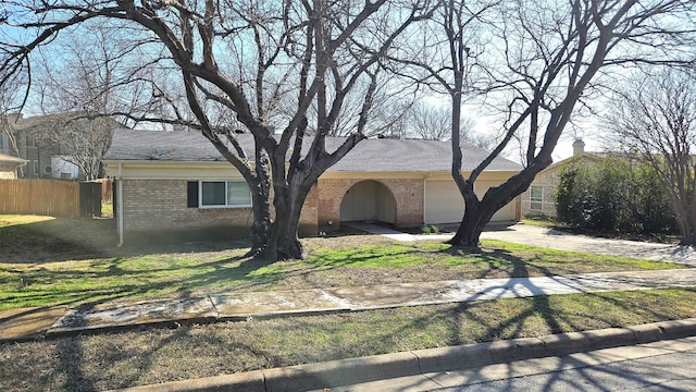 ranch-style house featuring a front lawn