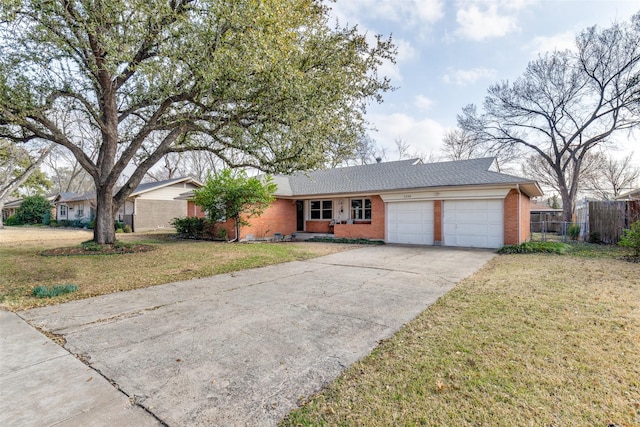 ranch-style house featuring a garage and a front yard