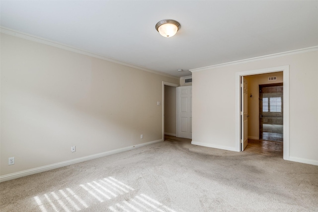 unfurnished bedroom with ornamental molding and light carpet