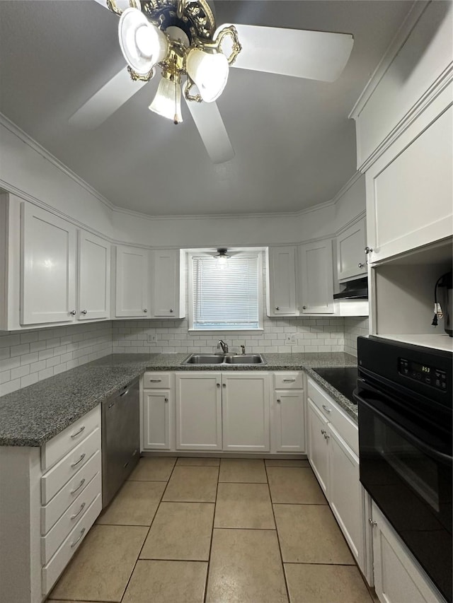 1714 Laurel Rd, Gainesville, TX 76240 - kitchen featuring black appliances, a sink, backsplash, light tile patterned floors, and white cabinets