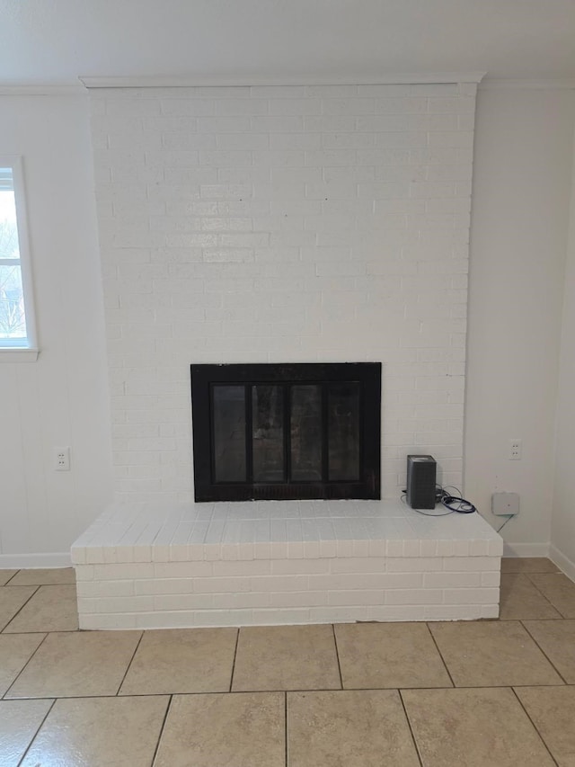 1714 Laurel Rd, Gainesville, TX 76240 - detailed view of ornamental molding, a fireplace, and baseboards