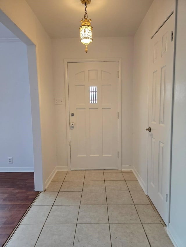 1714 Laurel Rd, Gainesville, TX 76240 - entryway featuring baseboards and light tile patterned flooring