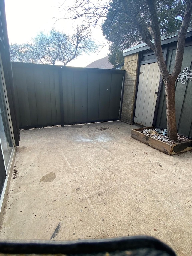 view of patio with fence