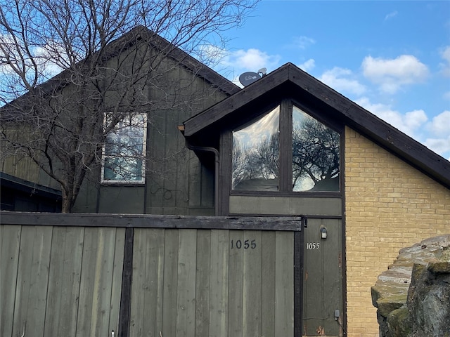 exterior space with brick siding