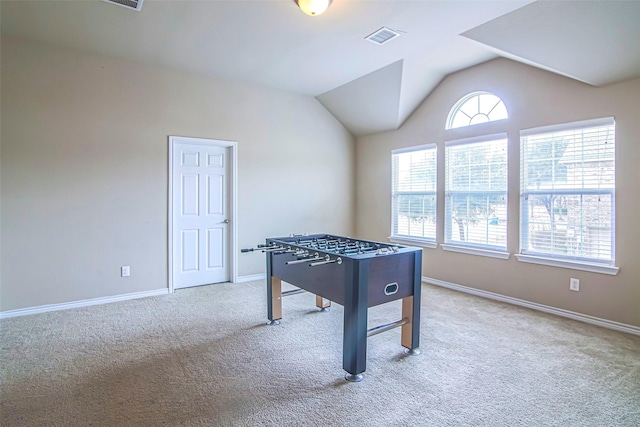 game room with lofted ceiling and carpet floors