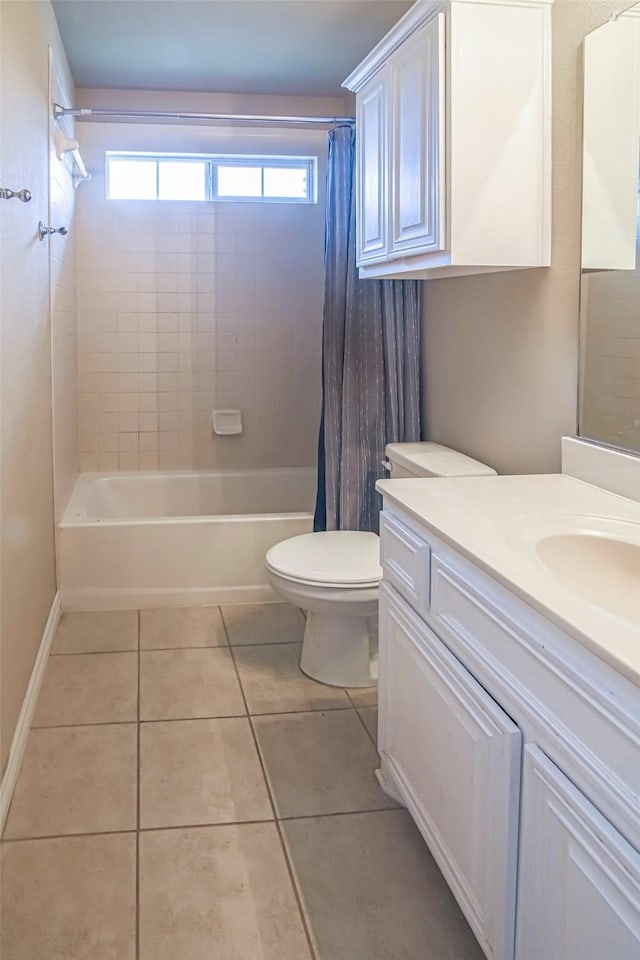 full bathroom with shower / tub combo, vanity, tile patterned floors, and toilet