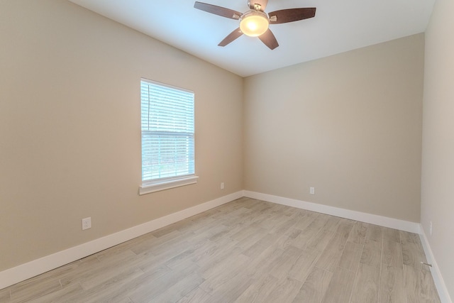 empty room with light hardwood / wood-style floors and ceiling fan