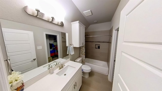 full bathroom featuring vanity, shower / tub combo, and toilet