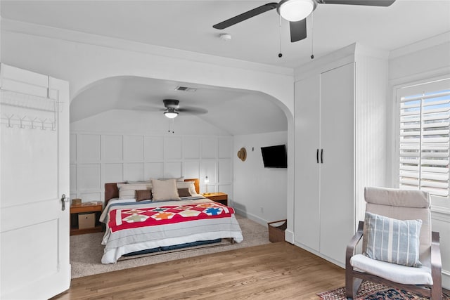 bedroom with hardwood / wood-style flooring and ceiling fan