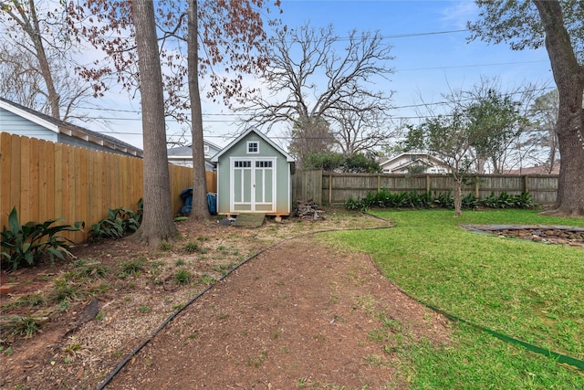 view of yard featuring a storage unit