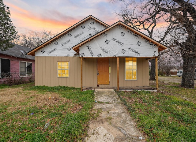 view of front of home with a lawn