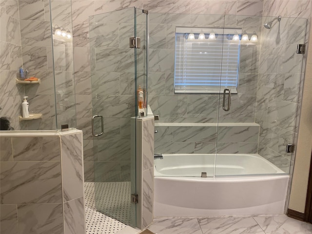 bathroom featuring shower with separate bathtub