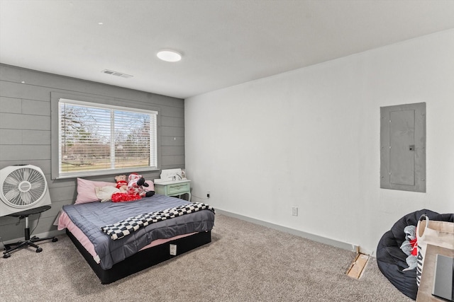 carpeted bedroom featuring electric panel