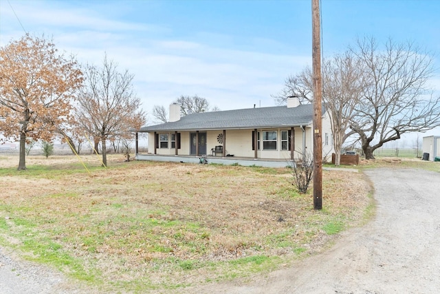 ranch-style house with a porch