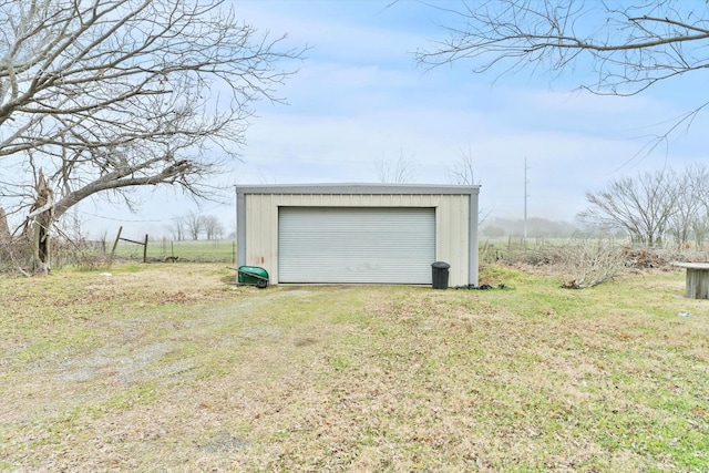 garage with a yard