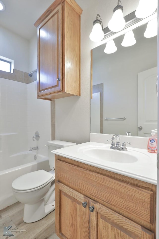 full bathroom with vanity, shower / bathing tub combination, and toilet