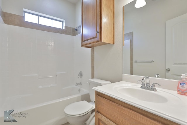 full bathroom with shower / tub combination, vanity, and toilet