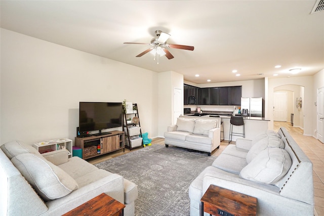 living room featuring ceiling fan