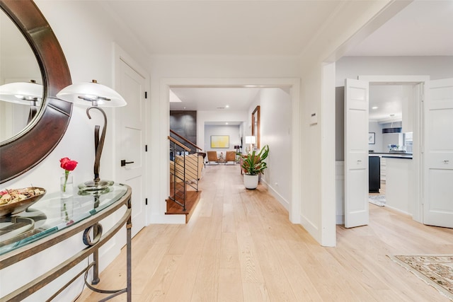 hallway with light wood-type flooring