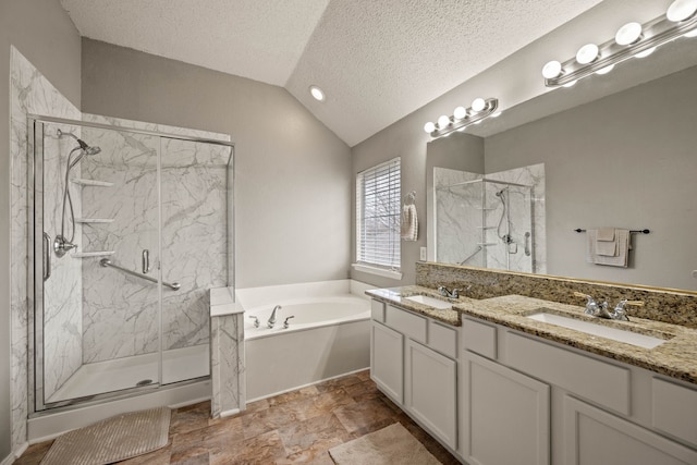 bathroom featuring lofted ceiling, independent shower and bath, vanity, and a textured ceiling