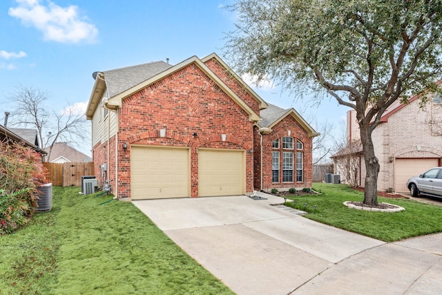 front of property with a front yard and central air condition unit