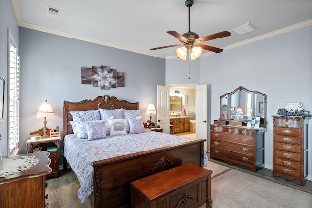 bedroom with ceiling fan, ensuite bath, ornamental molding, and light hardwood / wood-style flooring