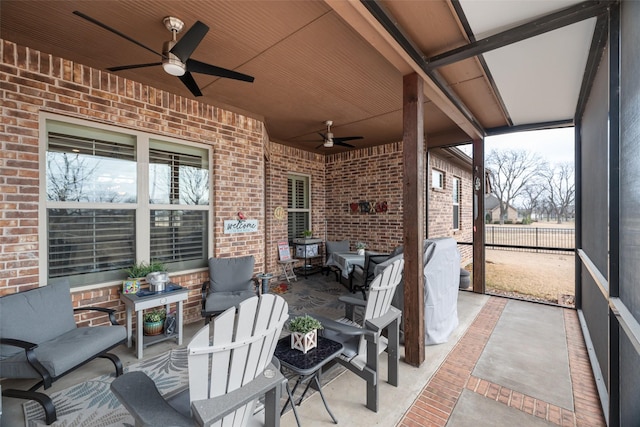 view of patio / terrace featuring ceiling fan