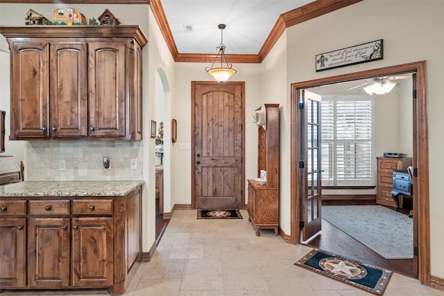 foyer with crown molding