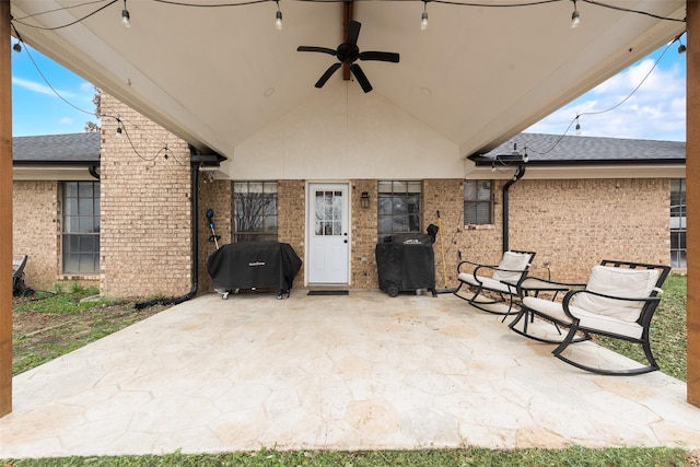 view of patio / terrace with area for grilling and ceiling fan