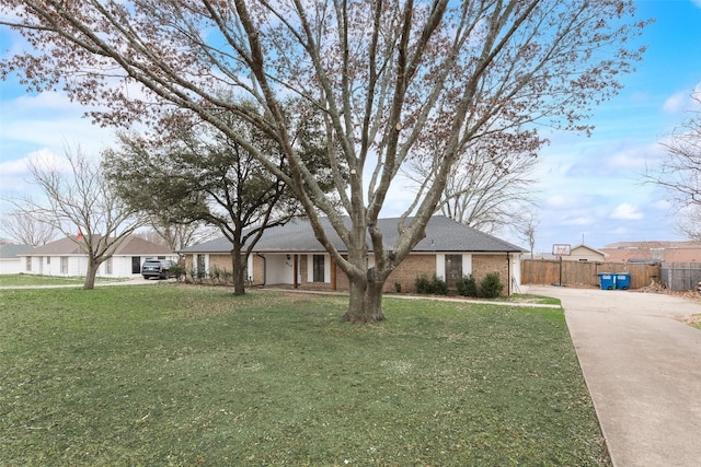 ranch-style house with a front yard