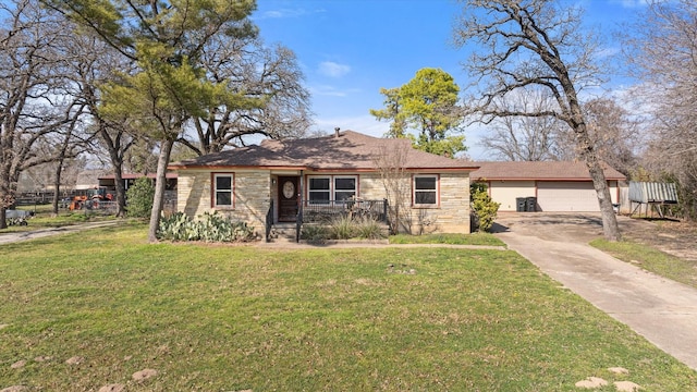 view of front of home with a garage and a front yard