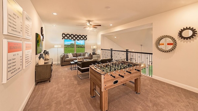 recreation room featuring lofted ceiling, carpet floors, and ceiling fan