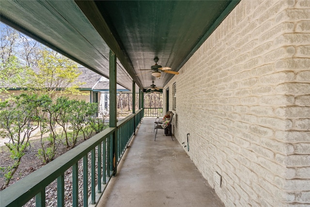balcony featuring a ceiling fan