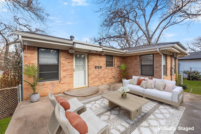 back of house with a patio area and outdoor lounge area