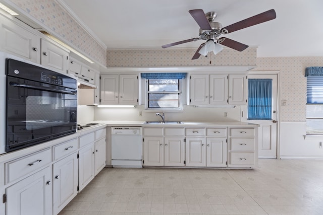 kitchen featuring white cabinetry, sink, crown molding, and white appliances