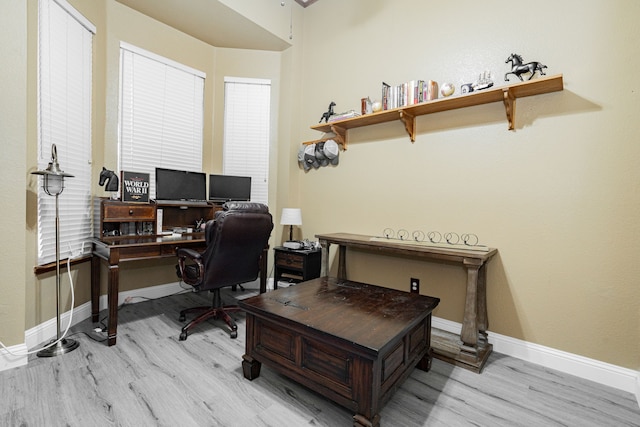 home office featuring light hardwood / wood-style floors