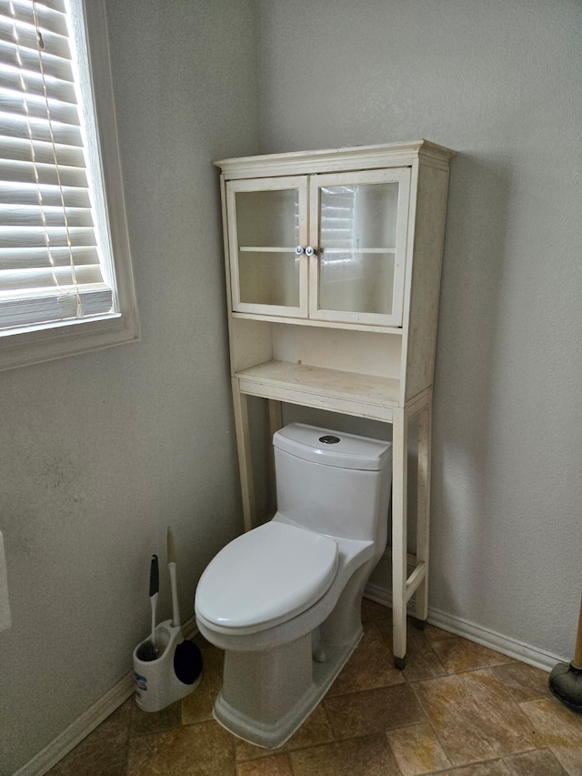 bathroom featuring toilet