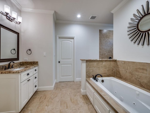 bathroom with vanity, a tub to relax in, and crown molding