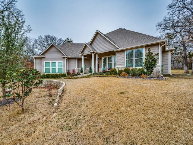 view of front of home with a front lawn