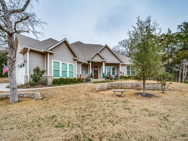 craftsman-style home featuring a garage