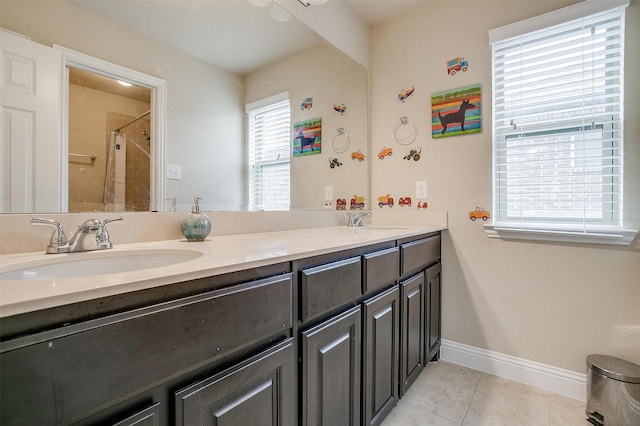 bathroom with tile patterned floors, vanity, and a shower with shower curtain