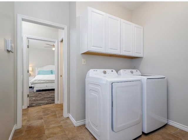 washroom with separate washer and dryer, cabinets, and ceiling fan